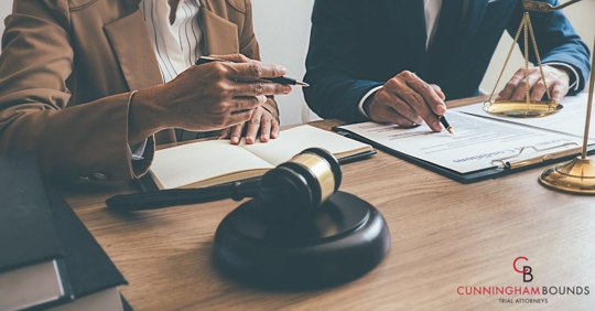 A person having a consultation with a lawyer.