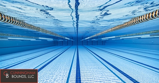 Photo taken underwater of a recreational pool with lanes